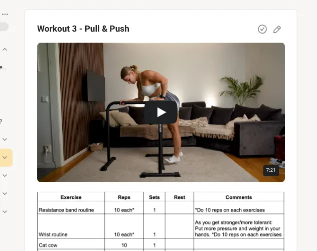 This image showcases a structured workout plan, titled "Workout 3 - Pull & Push." The video thumbnail features an individual demonstrating an exercise using parallettes in a cozy indoor setting. Below the video, a table outlines the exercises, reps, sets, rest periods, and additional comments to guide the workout. The setup and layout make it clear and easy to follow, ideal for beginners or anyone focusing on bodyweight training.